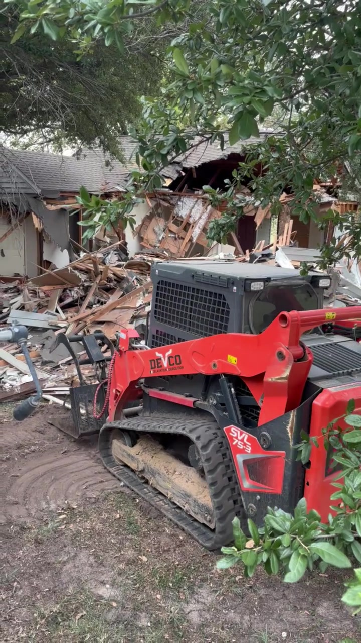 DEVCO skid steer working a demolition site in Texas
